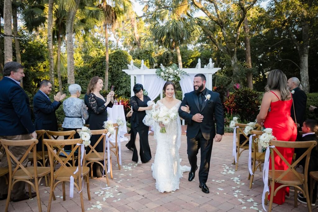 Bride and Groom Walking Down the Aisle Together